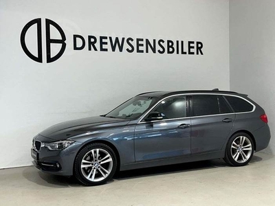 BMW 330d 3,0 Touring Sport Line aut.