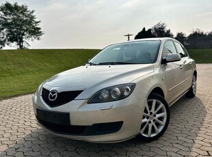 Mazda 3 1,6 Touring