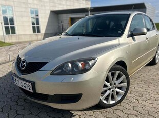 Mazda 3 1,6 Touring