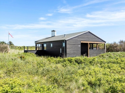 Hyggeligt og velholdt feriehus med havudsigt