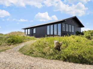 Hyggeligt træsommerhus med naturskøn panoramaudsigt