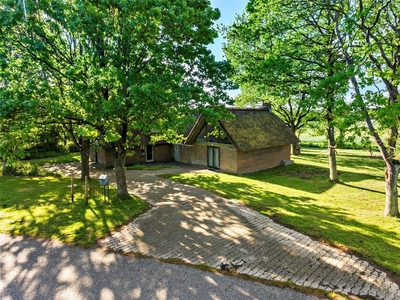 Sommerhus med stor spaafdeling og en fantastisk grund tæt ved Middelfart