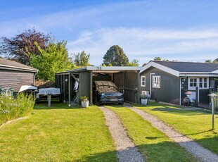 VELISTANDSAT SOMMERHUS BELIGGENDE I ROLIGE OMGIVELSER - KAN BRUGES HELE ÅRET!