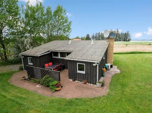 Hyggeligt sommerhus med en drømmebeliggenhed og udsigt over Limfjorden.