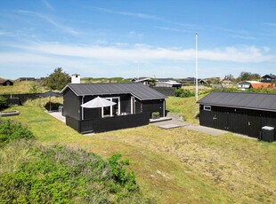 Hyggeligt træsommerhus tæt på Vesterhavet og bymidten i Blokhus