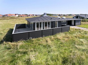 Enestående feriehus beliggende på en klittop med fantastisk panoramaudsigt.