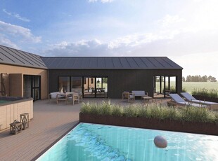 Luksuriøst sommerhus med aktivitetsrum, biograf og udendørs, opvarmet swimmingpool samt udendørs wellness