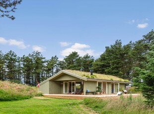 Charmerende træsommerhus i naturskønne Kettrup Bjerge