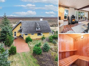 Hyggeligt og meget rummeligt stråtækt sommerhus med spa og sauna beliggende på adressen Gøgevej 46, Henne Strand.