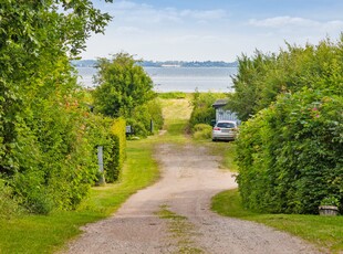 LÆKKERT KVALITETSOMMERHUS I KULHUSE, HELÅRSANVENDELIGT FOR PENSIONISTER