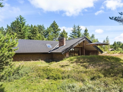 Charmerende sommerhus på fredelig naturgrund