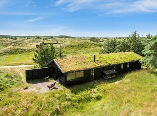 Charmerende bjælkehus i naturskønne omgivelser