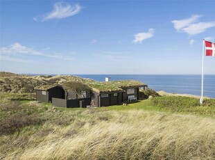 Helt igennem hyggeligt sommerhus med fantastisk havudsigt