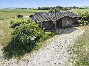 Dejligt sommerhus med panoramaudsigt over mark og fjord