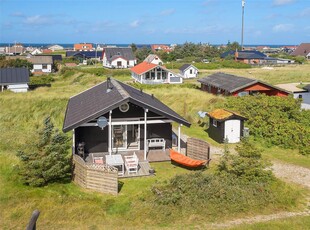 Lille og særdeles hyggeligt sommerhus ved Lild Strand