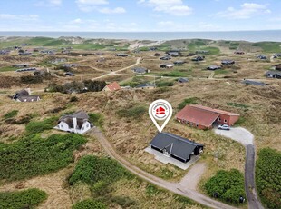 Lyst og indbydende sommerhus mellem Ringkøbing Fjord og Vesterhavet