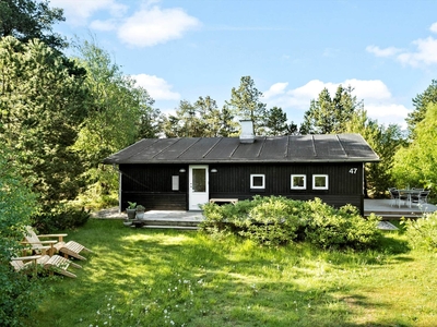 Hyggeligt sommerhus i ugenerede naturomgivelser