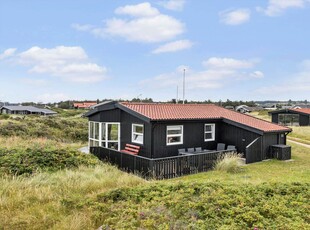 Lyst og hyggeligt sommerhus i Harerenden med havudsigt