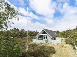 Dejligt træsommerhus i fredelige og naturskønne Toftum