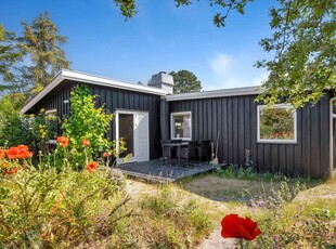 Hyggeligt sommerhus tæt på god badestrand