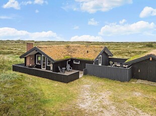 Skønt sommerhus med lys indretning og naturskønne omgivelser