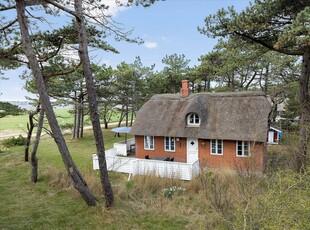 Dejligt sommerhus på stor naturgrund med udsigt til åbent landskab